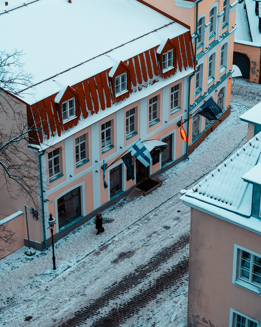 View from above of a snowy old town street